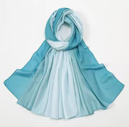 www.amodeyah.com/cdn/shop/files/Ocean Breeze Ombre Satin Hijab – Turquoise to Ice Blue Gradient Scarf.jpg