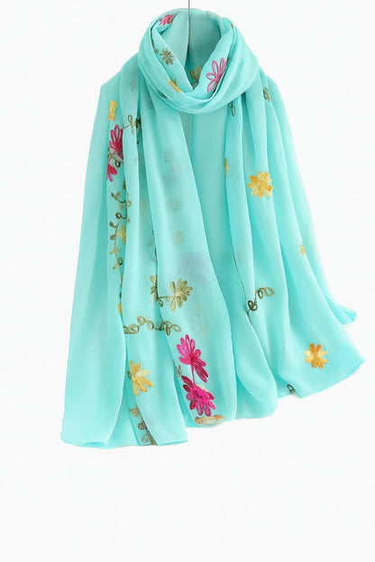 https://www.amodeyah.com/cddn/shop/files/Turquoise_with_Multi-Color_Floral_Embroidery.jpg